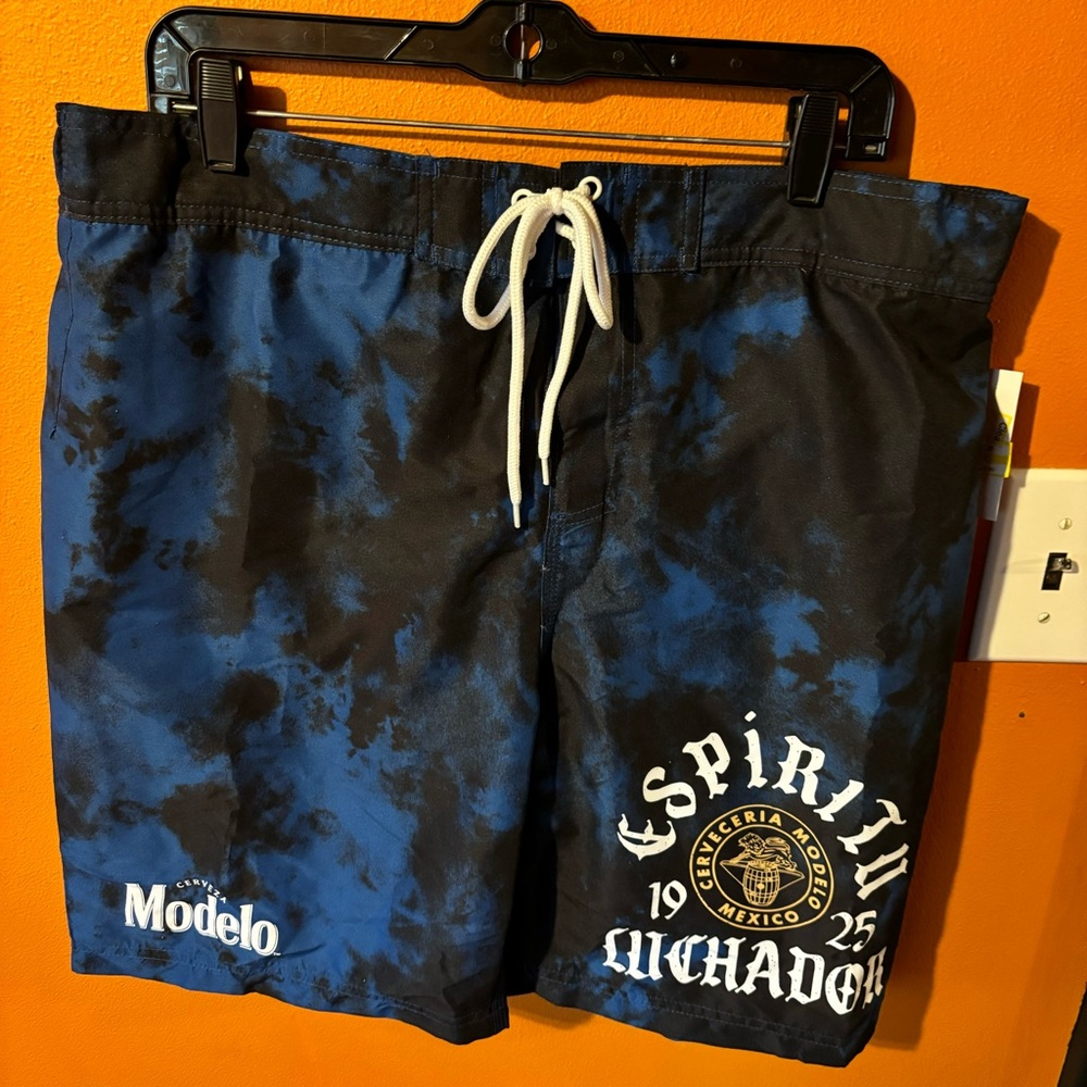 Men’s Modelo tie dye blue board shorts L NWT